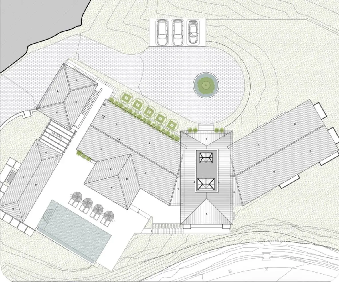 Site and roof plan showing the villa within its plot.