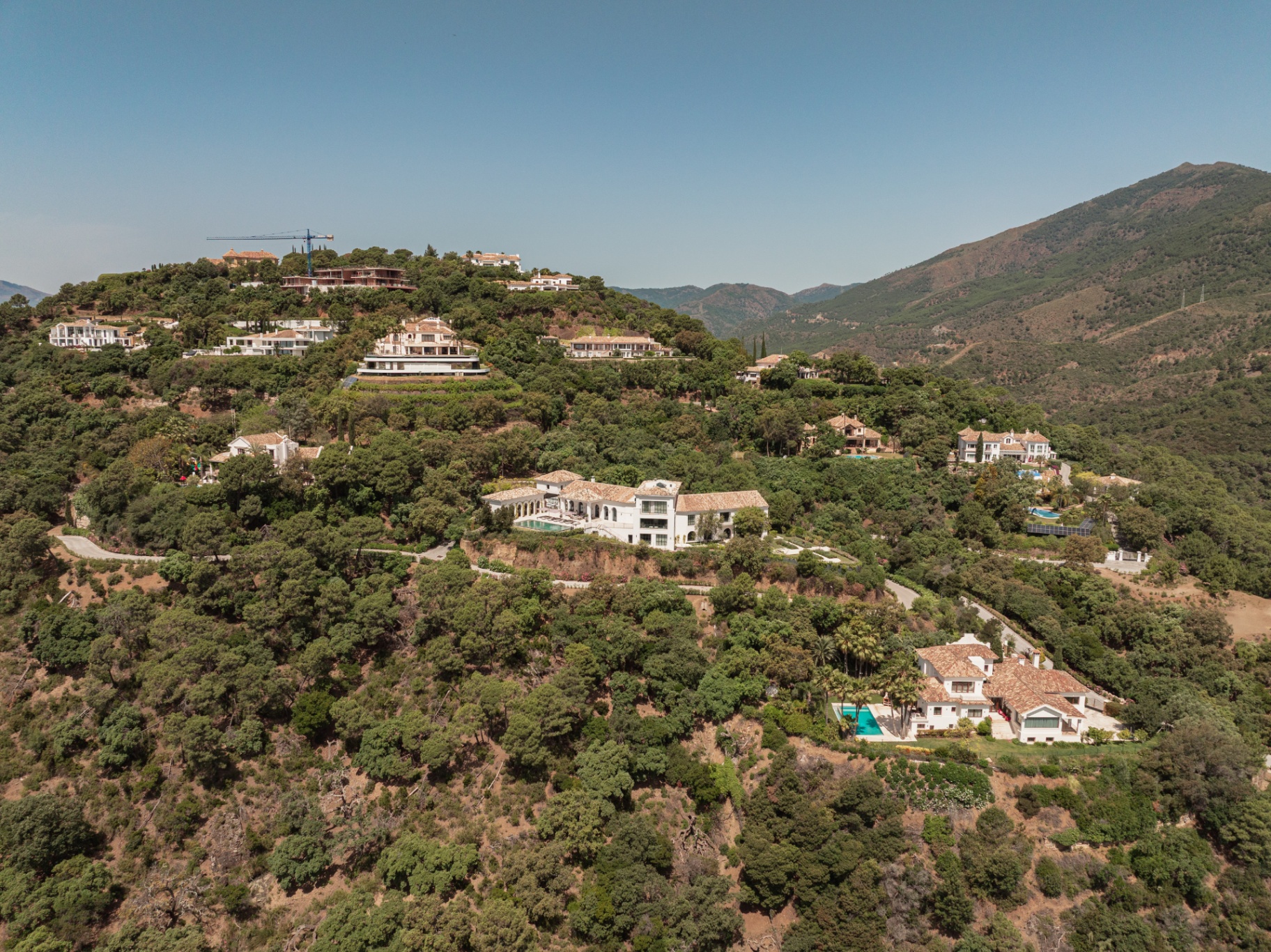 Aerial view of Casa Servetta on its private hillside within La Zagaleta.